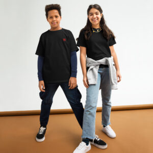Two kids posing in casual black shirts