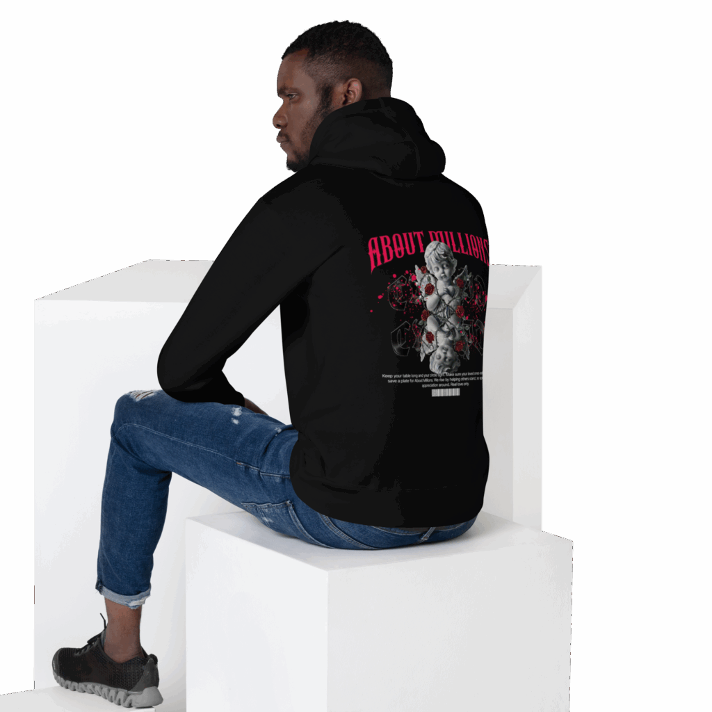 Seated man wearing black hoodie with graphic