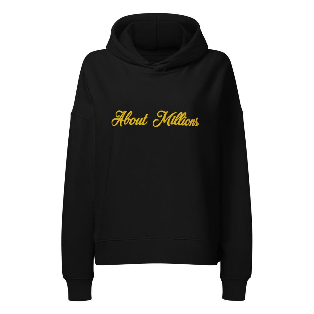 Black hoodie with yellow "About Millions" embroidery