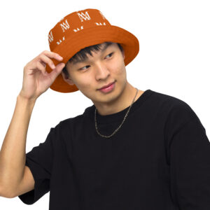 Young man wearing orange bucket hat, black shirt