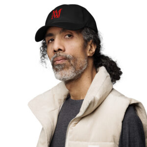 Man wearing black cap and beige puffer vest
