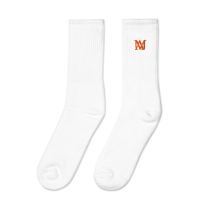 White crew socks with orange M logo