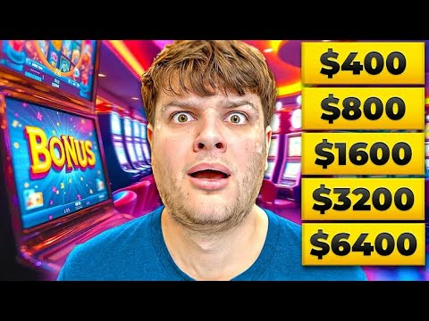 Surprised man at slot machines with jackpots