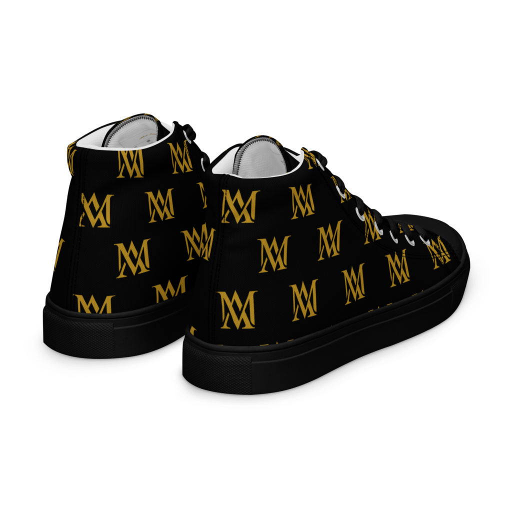 Black high-top sneakers with gold monogram pattern