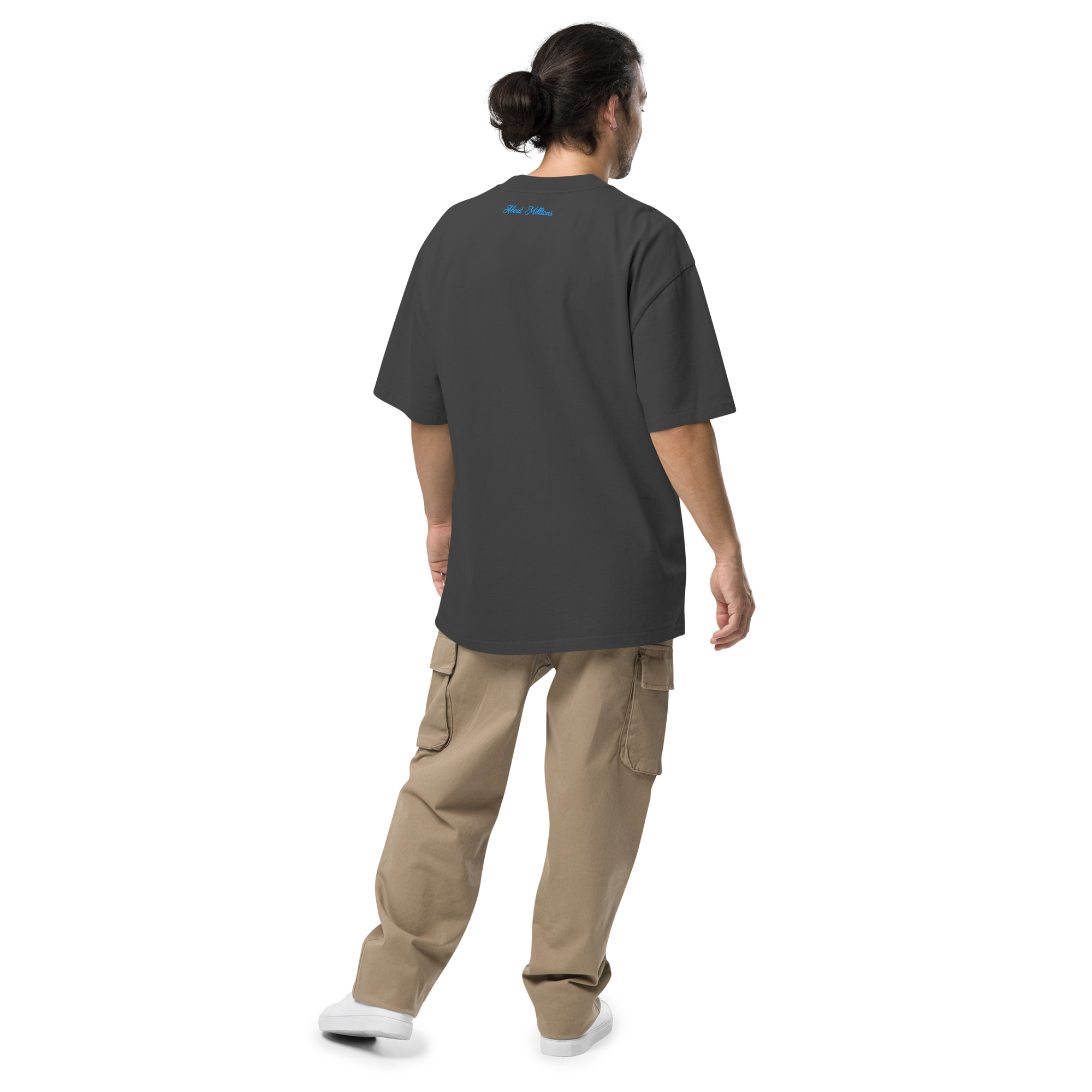Person wearing dark gray tee and cargo pants