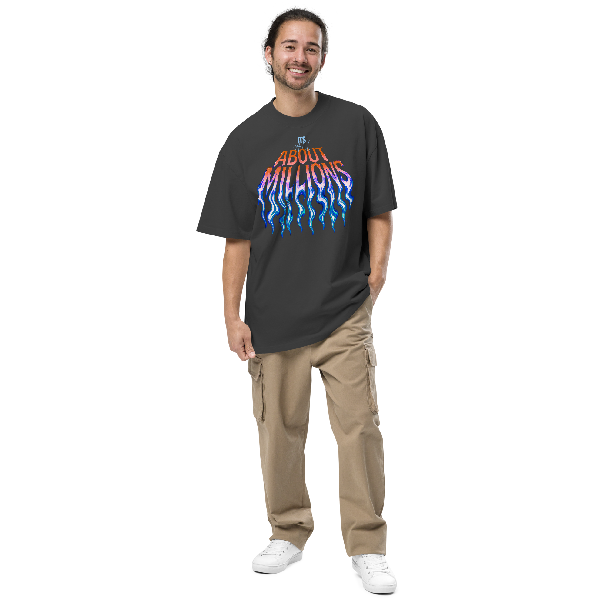 Smiling man wearing About Millions graphic tee