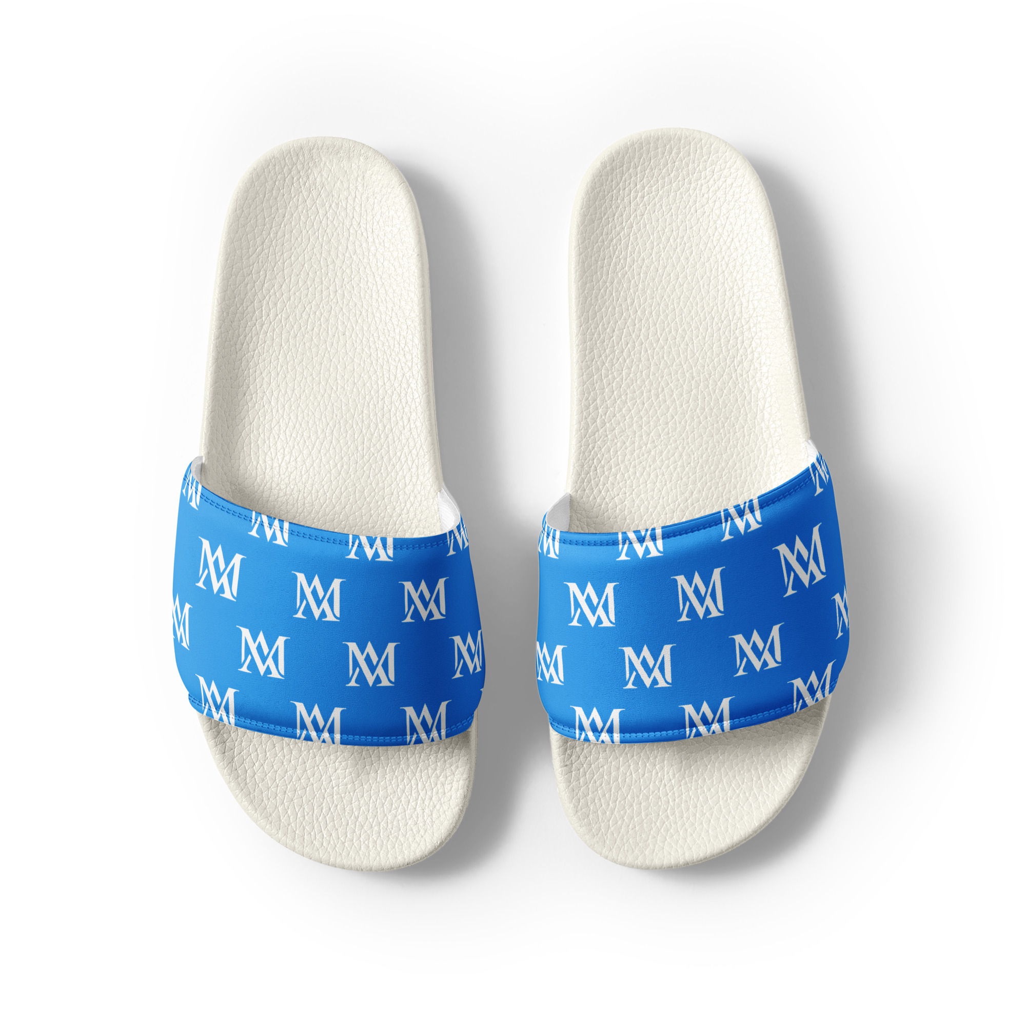 Pair of white slides with blue monogrammed straps