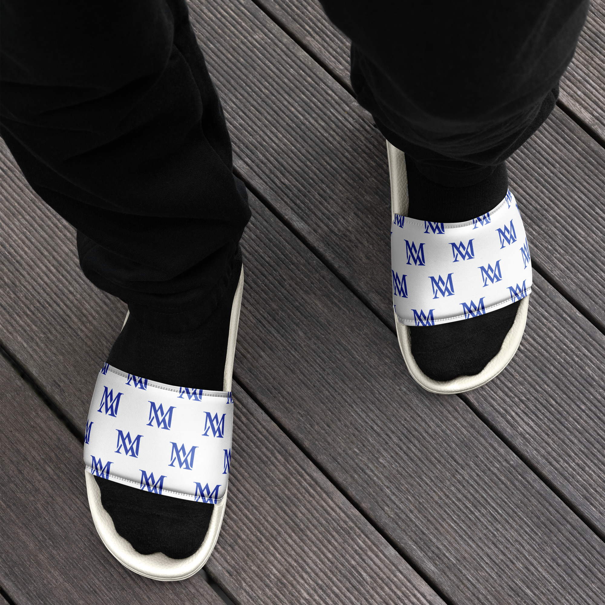 White monogram slide sandals with black socks