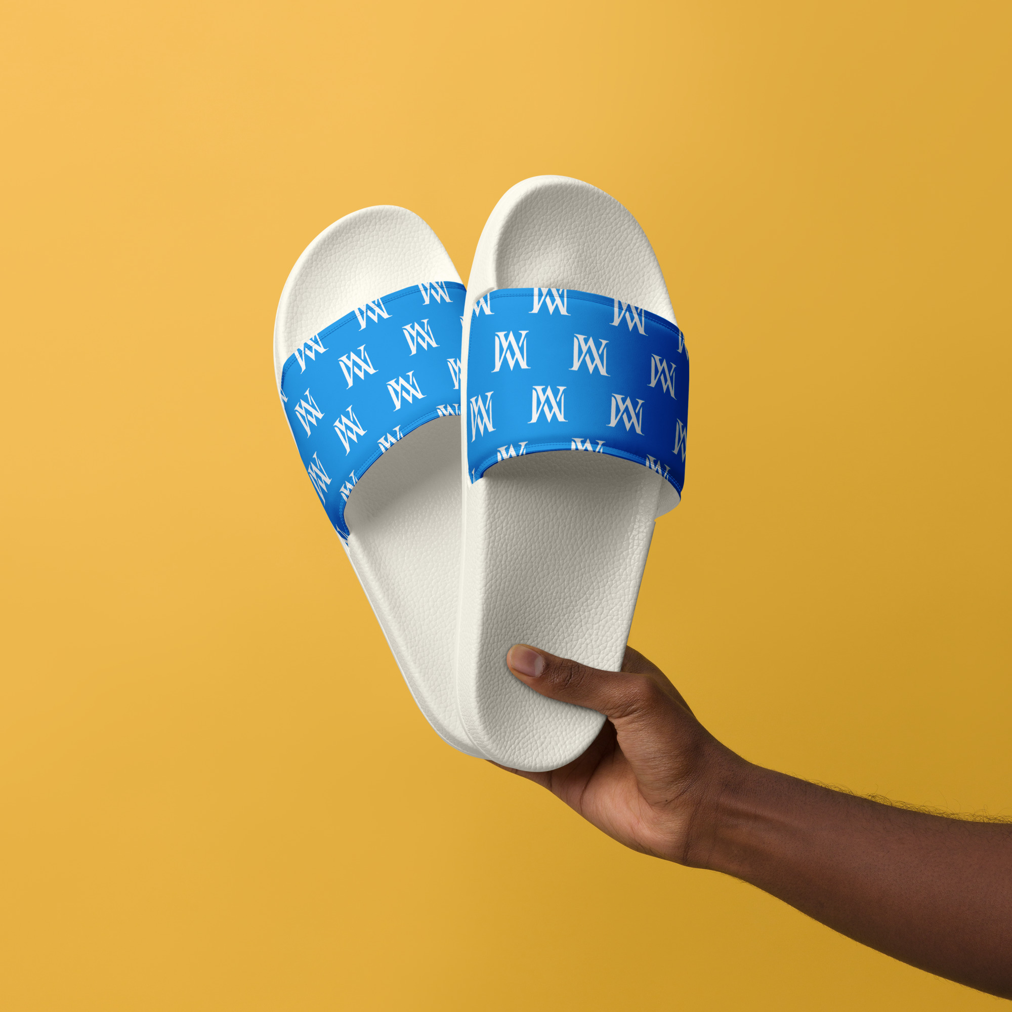 Hand holding white slides with blue straps